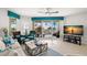 Light and airy living room with balcony access and views of the ocean at 11 San Marco St # 407, Clearwater Beach, FL 33767