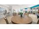 Open-concept condo design seamlessly connects the dining, kitchen, and living areas, perfect for modern living at 11 San Marco St # 407, Clearwater Beach, FL 33767