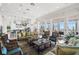 The common lounge area is beautifully appointed with comfortable seating and ocean views at 11 San Marco St # 407, Clearwater Beach, FL 33767