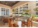 Well-equipped outdoor kitchen with grill, bar, and dining space at 11 San Marco St # 407, Clearwater Beach, FL 33767