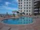 Luxury condo featuring a beautiful pool and ocean view at 11 San Marco St # 407, Clearwater Beach, FL 33767