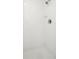 Shower features bright tile work and updated fixtures at 11 San Marco St # 407, Clearwater Beach, FL 33767