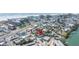Aerial view of the home surrounded by residential area near the water at 126 119Th Ave, Treasure Island, FL 33706