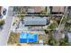 Aerial view of the property showing the roof, deck, and surrounding yard at 126 119Th Ave, Treasure Island, FL 33706