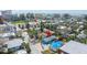 Aerial view shows the home with mature trees in a central location at 126 119Th Ave, Treasure Island, FL 33706