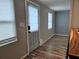 Entryway featuring neutral wall paint, tile floors, and a stylish exterior door with blinds at 126 119Th Ave, Treasure Island, FL 33706
