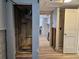 Hallway showcasing unfinished walls, wood-look tile flooring, and views into other rooms at 126 119Th Ave, Treasure Island, FL 33706