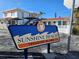 Welcome sign for Sunshine Beach on Treasure Island, a beautiful waterfront community at 126 119Th Ave, Treasure Island, FL 33706