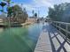 Scenic water view from a wooden dock showcasing community waterfront access at 126 119Th Ave, Treasure Island, FL 33706