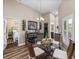 Bright dining area features a glass table and is conveniently located near the kitchen at 13302 Trailing Moss Dr, Dade City, FL 33525