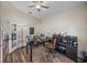 Home office space with a spacious desk, comfortable chair, and ample storage at 13302 Trailing Moss Dr, Dade City, FL 33525
