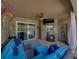 Inviting covered patio with ample seating and access to the pool area at 13302 Trailing Moss Dr, Dade City, FL 33525