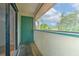 Balcony overlooking lush trees and greenery at 1424 Highland Ridge Cir, Brandon, FL 33510
