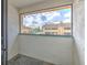 Exterior balcony showcasing view of neighboring buildings and blue skies at 1424 Highland Ridge Cir, Brandon, FL 33510