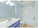 Bathroom featuring sink, toilet, and shower-tub combo at 1424 Highland Ridge Cir, Brandon, FL 33510