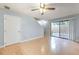 The living room features a sliding glass door that floods the space with natural light at 1424 Highland Ridge Cir, Brandon, FL 33510