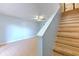 Bright living room featuring tile flooring and staircase access to the second floor at 1424 Highland Ridge Cir, Brandon, FL 33510