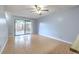 Relax in the spacious living room offering natural light and neutral flooring at 1424 Highland Ridge Cir, Brandon, FL 33510