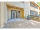 Paved backyard patio with sliding glass doors leading indoors at 1424 Highland Ridge Cir, Brandon, FL 33510