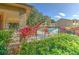 Community pool surrounded by lush landscaping, offering a serene and inviting recreational space at 1424 Highland Ridge Cir, Brandon, FL 33510