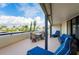 Large balcony with ample seating, perfect for entertaining and enjoying scenic community views at 1460 Gulf Blvd # 108, Clearwater, FL 33767
