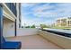 Inviting balcony with comfortable seating, showcasing stunning ocean views and coastal breeze at 1460 Gulf Blvd # 108, Clearwater, FL 33767