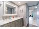 Bathroom with double vanity, white countertop, and modern fixtures, provides a bright and airy ambiance at 1460 Gulf Blvd # 108, Clearwater, FL 33767