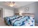 Cozy bedroom with two beds, neutral colors, and beach-themed decor creating a relaxing atmosphere at 1460 Gulf Blvd # 108, Clearwater, FL 33767