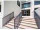 Elegant condominium building entrance, featuring modern design and welcoming access at 1460 Gulf Blvd # 108, Clearwater, FL 33767