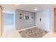 Inviting condo entryway with tile floors, gray walls, and stylish decor at 1460 Gulf Blvd # 108, Clearwater, FL 33767