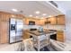 Bright kitchen with stainless steel appliances and a center island at 1460 Gulf Blvd # 108, Clearwater, FL 33767