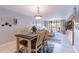 Inviting living room with coastal decor and balcony access at 1460 Gulf Blvd # 108, Clearwater, FL 33767