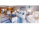 Inviting living room with easy access to the kitchen at 1460 Gulf Blvd # 108, Clearwater, FL 33767