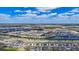 Expansive aerial view of the community showcasing lakefront homes and meticulous landscaping at 18023 Canopy Pl, Bradenton, FL 34211