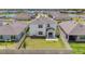 Aerial view of a home with a green backyard and privacy fence at 18023 Canopy Pl, Bradenton, FL 34211