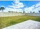 Spacious backyard with a privacy fence and green grass at 18023 Canopy Pl, Bradenton, FL 34211