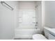 Bright bathroom with tub, tile, and new fixture at 18023 Canopy Pl, Bradenton, FL 34211