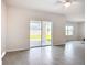 Bright living room with sliding glass doors leading to outdoor space at 18023 Canopy Pl, Bradenton, FL 34211