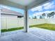 Outdoor patio with a view of the fenced backyard at 18023 Canopy Pl, Bradenton, FL 34211