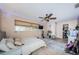 Relaxing bedroom features a ceiling fan, window, and space for a desk or storage at 1868 Juarez S Way, St Petersburg, FL 33712
