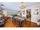 Cozy dining area featuring a dining table, chairs, and seamless flow into other rooms at 1868 Juarez S Way, St Petersburg, FL 33712