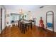 Bright dining room features a large table and chairs, with backyard views beyond at 1868 Juarez S Way, St Petersburg, FL 33712