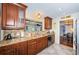 Updated kitchen boasts granite countertops, stainless appliances, and plenty of cabinet space at 1868 Juarez S Way, St Petersburg, FL 33712