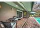 Enjoy outdoor living on this covered patio, next to a sparkling pool at 1868 Juarez S Way, St Petersburg, FL 33712