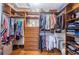 Spacious walk-in closet features custom shelving and ample storage at 1868 Juarez S Way, St Petersburg, FL 33712
