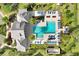 Aerial view of the community pool featuring lush landscaping, lounge chairs and a seating area at 18737 Noble Caspian Dr, Lutz, FL 33558