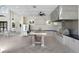 Community kitchen with stainless steel appliances, ample counter space, and bar seating at 18737 Noble Caspian Dr, Lutz, FL 33558