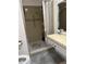 This bathroom features a glass door shower and a modern sink at 1903 Canterbury Ln # B2, Sun City Center, FL 33573