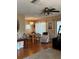 Living and dining area with hardwood floors, and neutral wall colors at 1903 Canterbury Ln # B2, Sun City Center, FL 33573