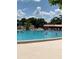 Relaxing outdoor pool where residents can gather, socialize and exercise at 1903 Canterbury Ln # B2, Sun City Center, FL 33573